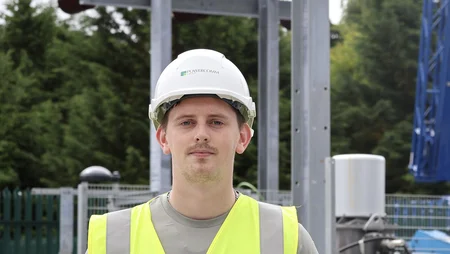 internship programme Tom, student on site in PPE gear