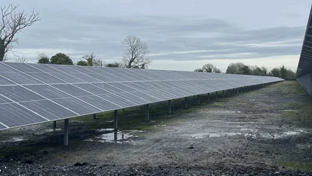 Long row of solar panels at Bullstown Solar farm Dec 2024