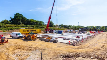 Shot of BESS 1 Battery storage plant construction with crane alternative angle.
